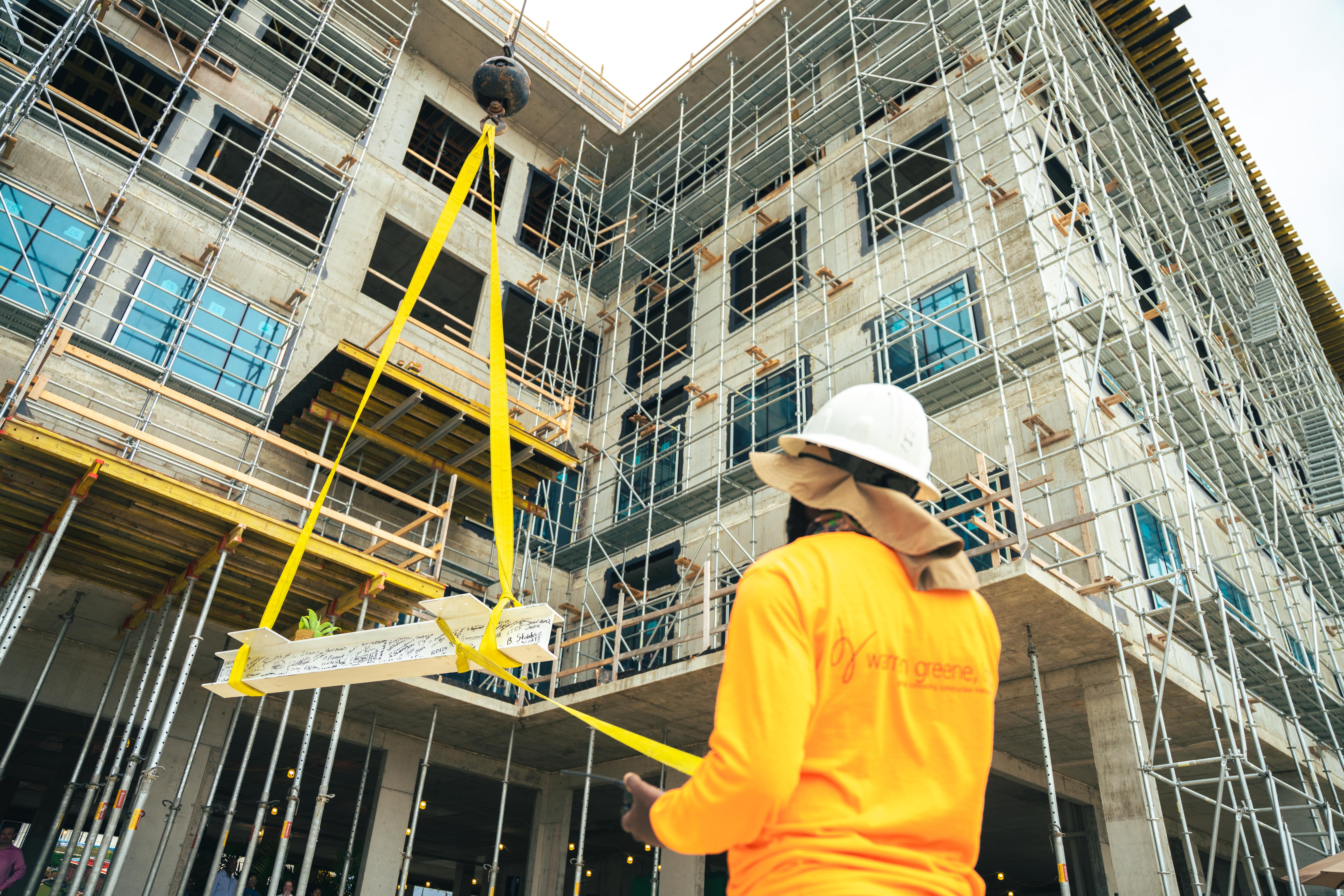 Camana Bay marks topping out of 55 Cerasee Way, future home of Health and Wellness Centre